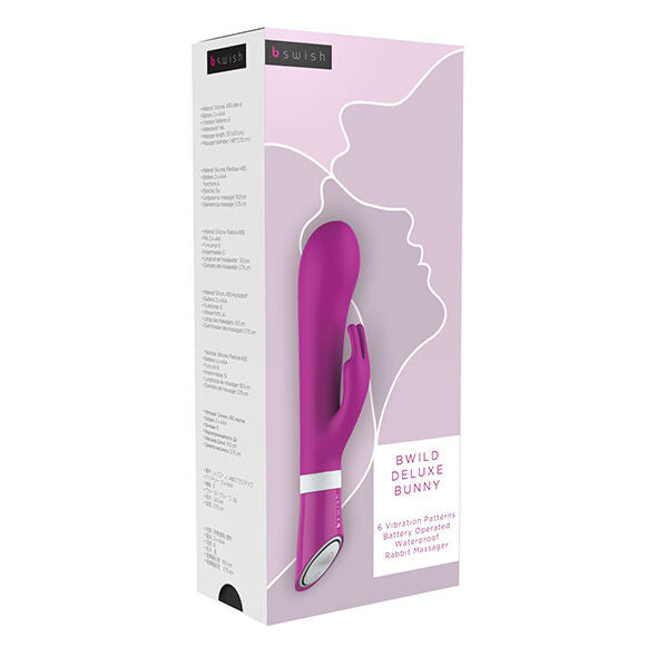 B SWISH BWILD Deluxe Bunny Rabbit Vibrator in Raspberry with ears and textured body for enhanced pleasure.