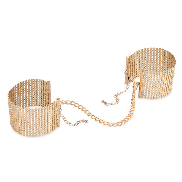 Golden metallic mesh handcuffs by Bijoux Désir Métallique, showcasing intricate design and elegant craftsmanship.