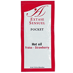 Aceite estimulante de fresa de la marca EXTASE SENSUAL en envase de 10 ml, con botella y etiqueta visible.