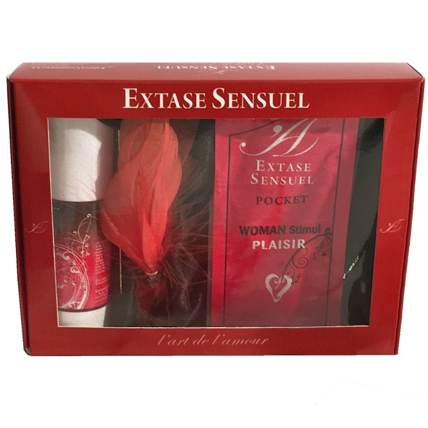 EXTASE SENSUAL travel gift set with elegant packaging and assorted sensual products displayed on a soft surface.
