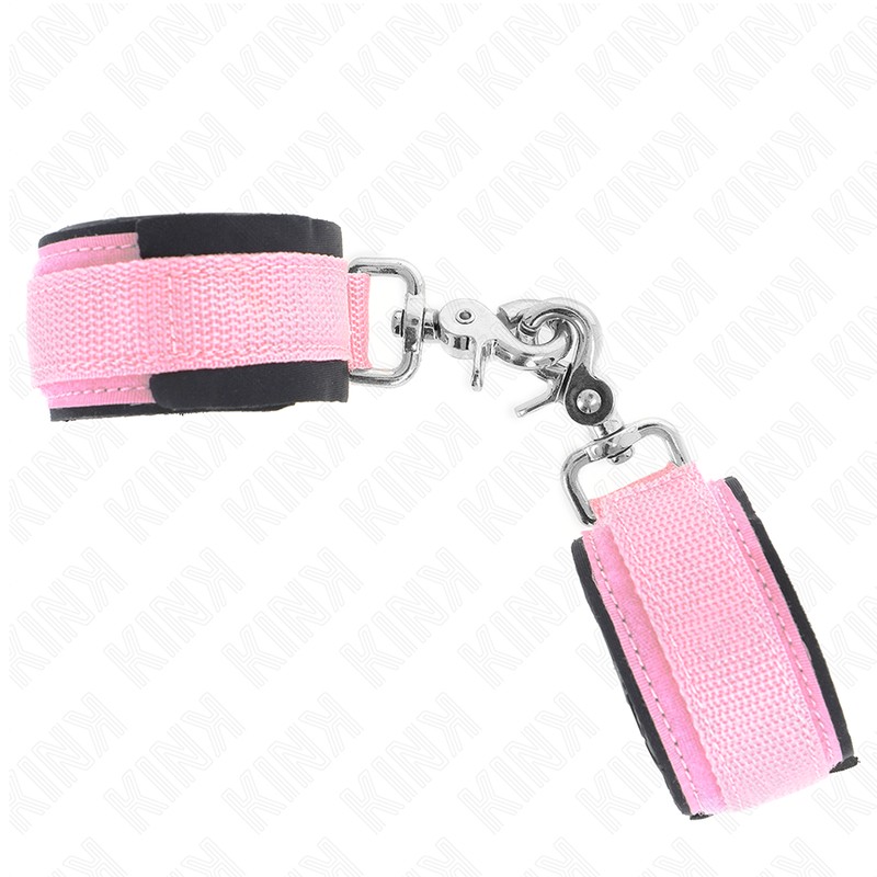 Muñequera ajustable de neopreno rosa de la marca KINK, tamaño 22-34 cm, con diseño cómodo y resistente para restricción de muñecas.