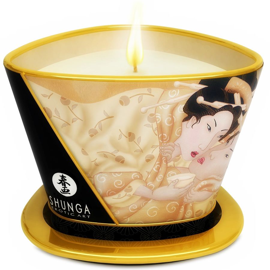 SHUNGA Mini Caress by Candlelight vanilla massage candle in a glass container, melted wax and wick visible.
