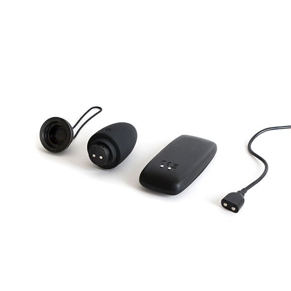 B SWISH BNAUGHTY PREMIUM UNLEASHED in black, featuring a sleek design and textured surface for enhanced pleasure.
