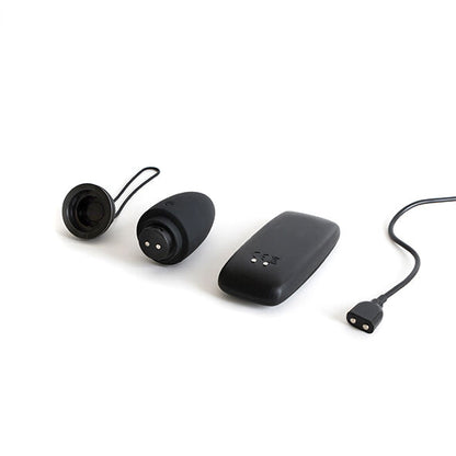 B SWISH BNAUGHTY PREMIUM UNLEASHED in black, featuring a sleek design and textured surface for enhanced pleasure.