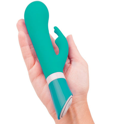 B SWISH BWILD Deluxe Bunny Rabbit Vibrator in jade color, featuring soft silicone ears and a compact design.