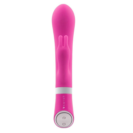 B SWISH BWILD Deluxe Bunny Rabbit Vibrator in raspberry color, featuring ears and a sleek design for targeted stimulation.