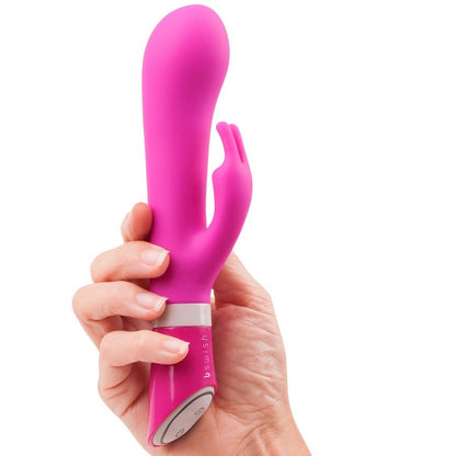 B SWISH BWILD Deluxe Bunny Rabbit Vibrator in Raspberry, featuring bunny ears and a sleek design for pleasure.