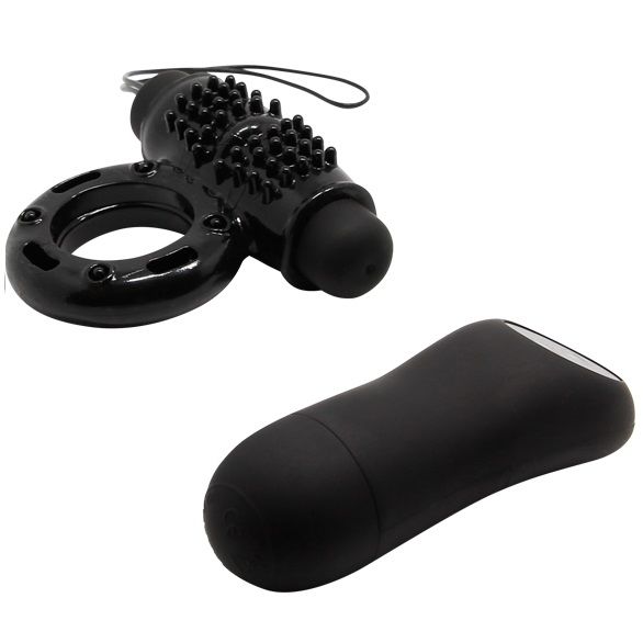 Black BAILE remote control ring 20V on a neutral background, showcasing its sleek design and smooth finish.