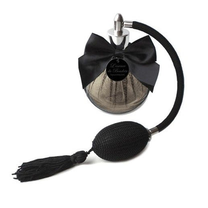 BIJOUX Esencia de Boudoir 100 ml fabric softener spray bottle with elegant design and floral scent, perfect for linens.
