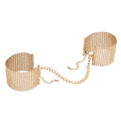 Golden metallic mesh handcuffs by Bijoux Désir Métallique, showcasing intricate design and elegant craftsmanship.