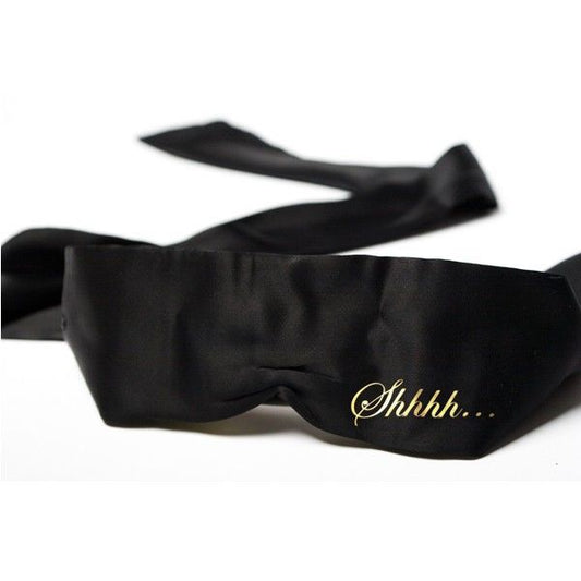 Antifaz de seda negro de BIJOUX INDISCRETS, accesorio de belleza y relajación con diseño elegante y suave.