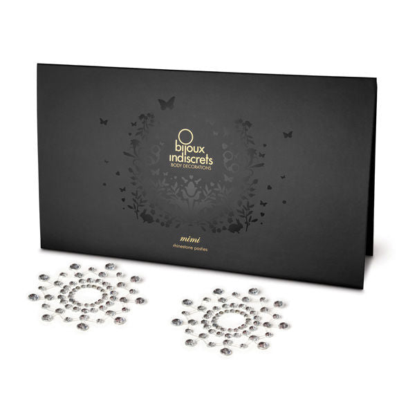 Silver BIJOUX JEWELRY Mimi Plata necklace displayed on a soft fabric background, showcasing intricate design details.