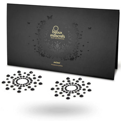 Silver BIJOUX MIMI PLATA jewelry featuring delicate design and intricate detailing, elegantly displayed on a soft fabric background.