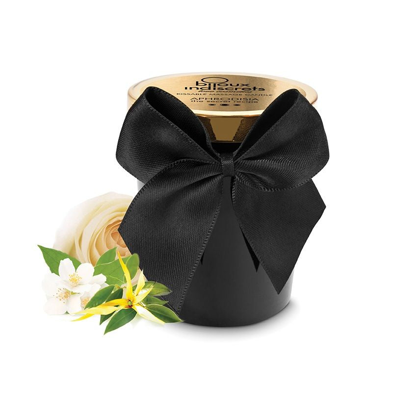 BIJOUX LOVE COSMETIQUES Melt My Heart scented massage candle with aphrodisiac properties, displayed in a serene setting.