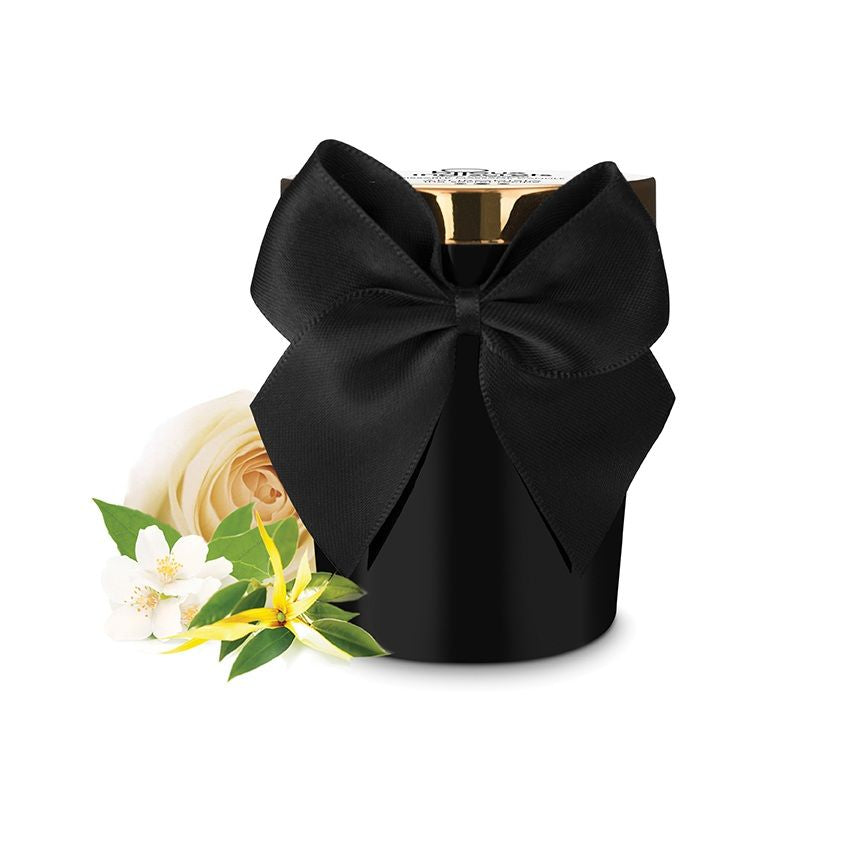 Bijoux Melt My Heart scented massage candle with aphrodisiac properties, showcasing its elegant design and warm glow.