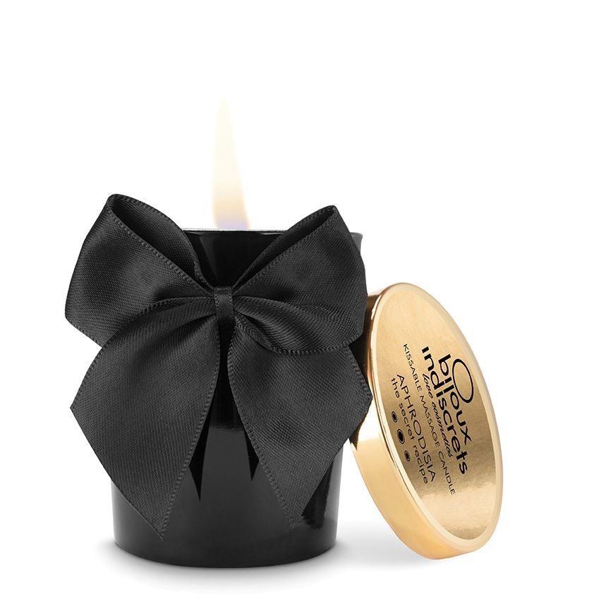 BIJOUX MELT MY HEART scented massage candle with aphrodisiac ingredients, featuring a warm, inviting glow.