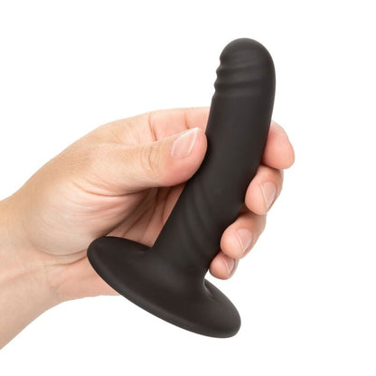 Dildo Boundless de Calexotics de 12 cm, compatible con arnés, en color transparente con textura realista.
