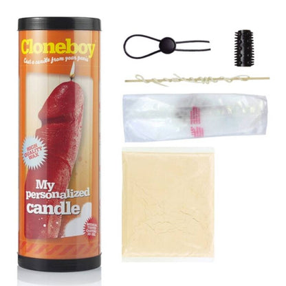 CLONEBOY candle-shaped penis mold kit displayed with detailed instructions and included materials for creating a replica.