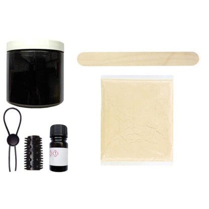 Black CLONEBOY penis cloning kit displayed with molds and accessories for creating a realistic replica.