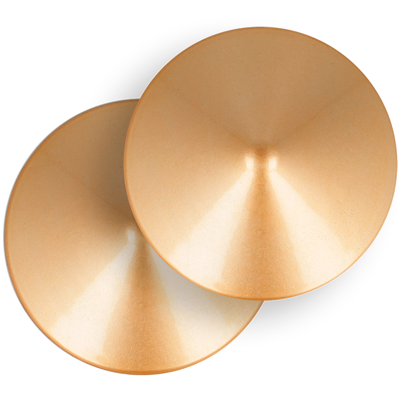 Cubre pezones metálicos con círculos dorados de la marca Coquette Accessories, diseño chic y elegante para lencería.