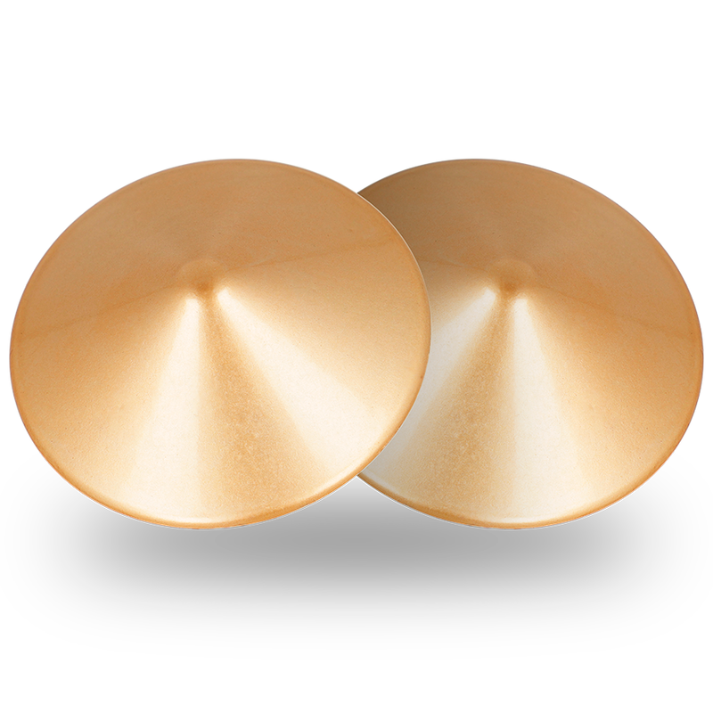 Cubre pezones metálicos con círculos dorados de Coquette Accessories, diseño chic y elegante para accesorios de moda.