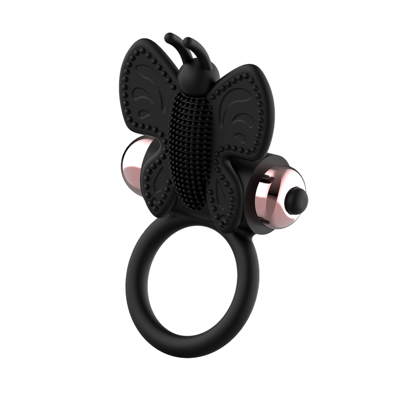Anillo vibrador negro y dorado Coquette Chic Desire con diseño mariposa para placer íntimo.