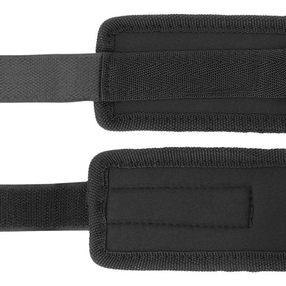 Darkness Bondage neoprene handcuffs, black with adjustable straps, designed for bondage and restraint play.