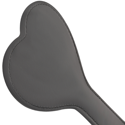 Black paddle from DARKNESS SENSATIONS, featuring a sleek design for fetish play and BDSM activities.