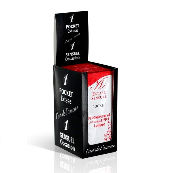 Aceite de masaje Extase Sensual con efecto calor y feromonas en botella de 10 ml, ideal para momentos íntimos.