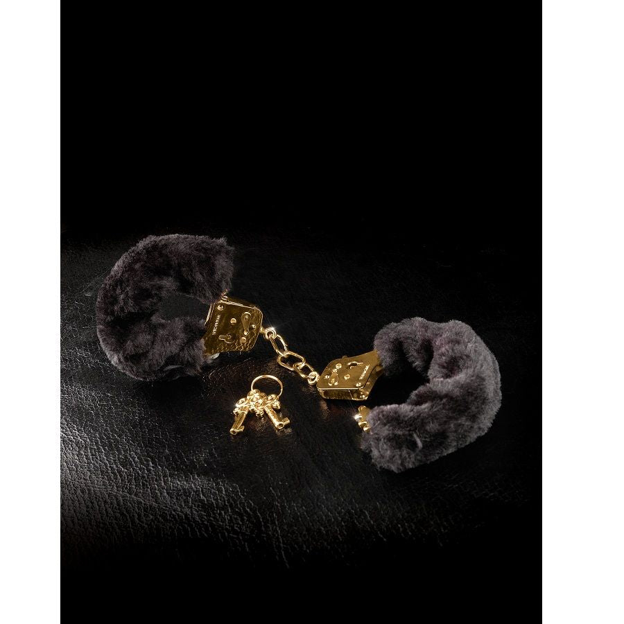 Fetish Fantasy Gold plush handcuffs in soft fabric, designed for comfortable restraint and playful bondage.