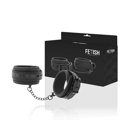 Esposas para tobillos de cuero vegano con forro de neopreno, parte de la colección FETISH SUBMISSIVE BONDAGE, para restricción y juego erótico.