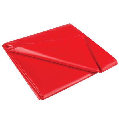JOYDIVISION SexMAX reusable red plastic sheet displayed on a bed, ideal for protection during intimate moments.
