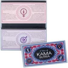 KHEPER GAMES 52 Trucos Sexuales Absolutamente Orgásmicos card set displayed on a table with colorful graphics.