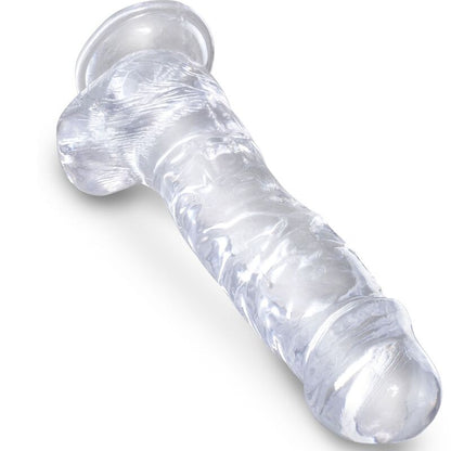Pene realístico transparente de 16.5 cm de la marca KING COCK con testículos, con detalles realistas y superficie lisa.