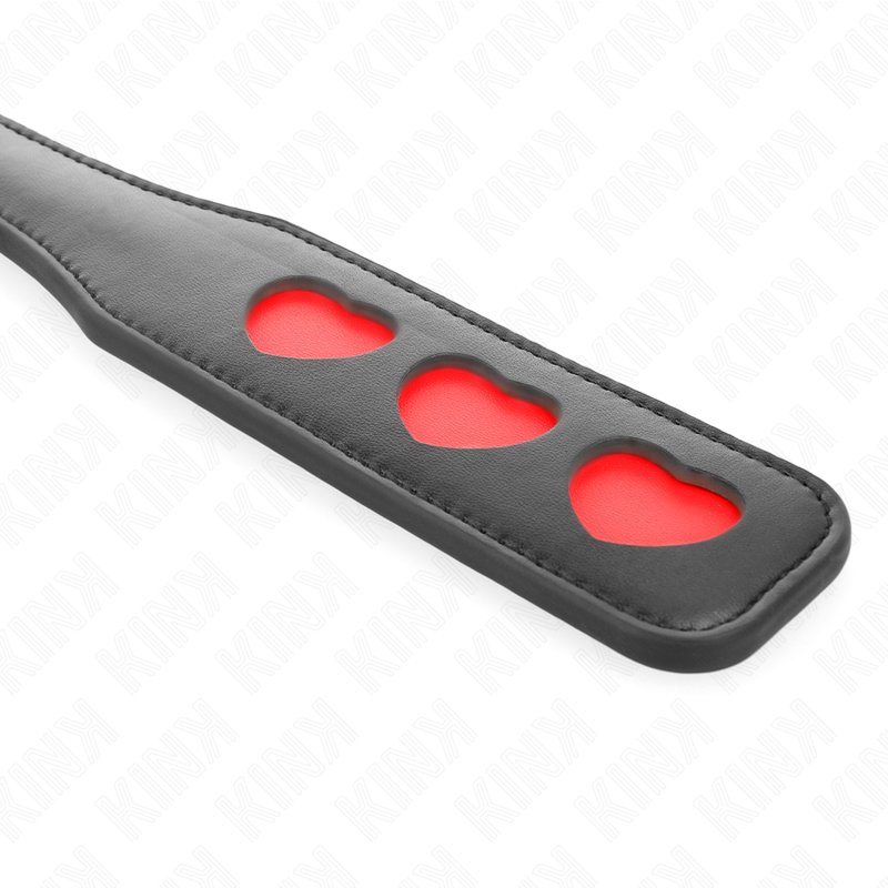 Pala de corazones KINK Impact & Touch, de 32 x 6 cm, con diseño de corazones en color negro y detalles en rojo.