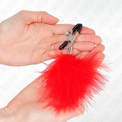 Pinzas para pezones KINK NIPPLE GRIP con pluma roja de 7 cm, diseño delicado y ajustable para sensaciones intensas.