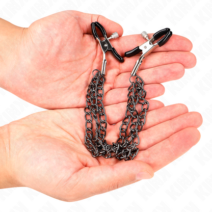 Black nipple clamps with triple chain design, adjustable lengths of 20, 23, and 28 cm by KINK NIPPLE GRIP.