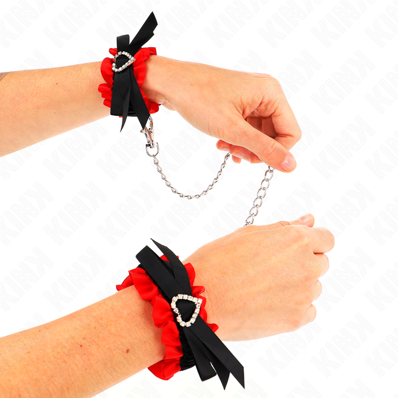 Muñequera elástica de encaje KINK con detalle de corazón rojo ajustable de 22 a 35 cm para restricción de muñecas.