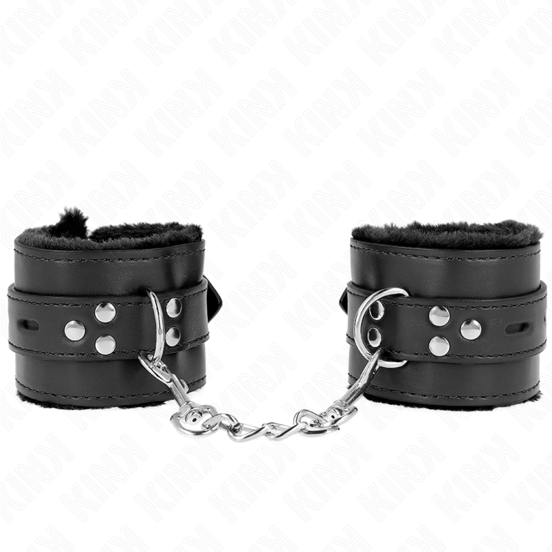 Muñequera KINK forrada con agujeros cuadrados y correa ajustable negra, tamaño 17-29 cm por 6 cm, en cuero resistente.