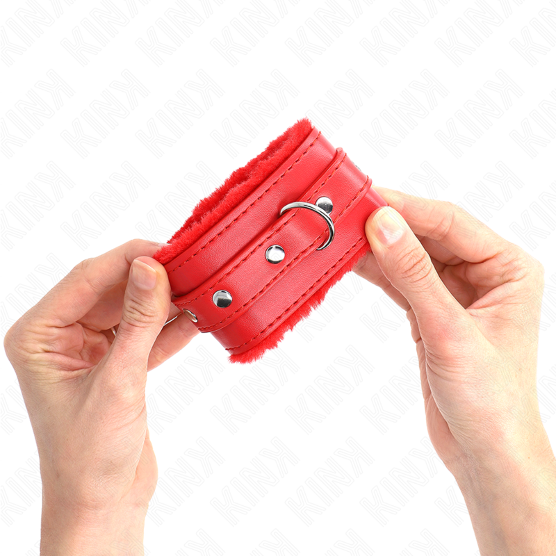 Muñequera forrada premium KINK en rojo con correa ajustable, tamaño 17-29 cm y 6 cm de ancho, para restricción y control.