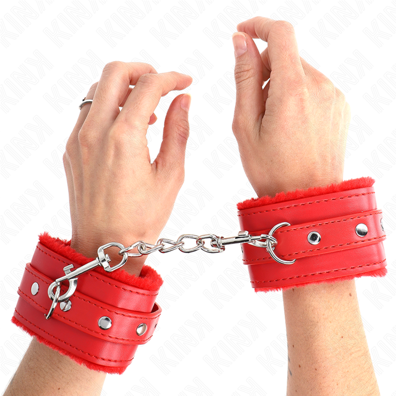 Muñequera forrada premium KINK en rojo con correa ajustable, tamaño 17-29 cm y 6 cm de ancho, para restricción segura.