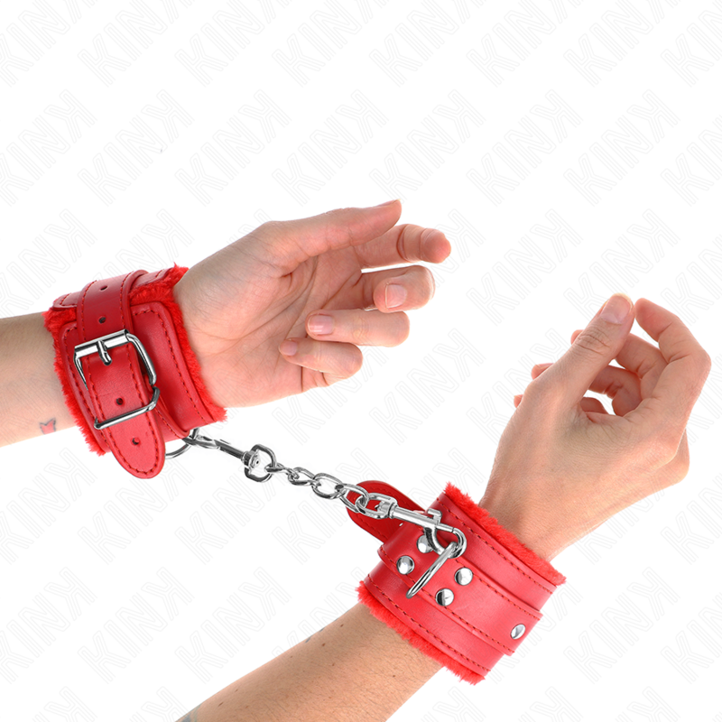 Muñequera forrada roja KINK con correa ajustable, tamaño 20-29 cm y 5.5 cm de ancho, para restricción y juego de roles.