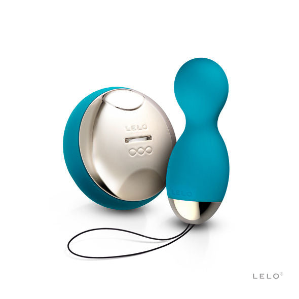 LELO Insignia Hula Blue Kegel balls displayed on a soft surface, showcasing their sleek design and elegant color.