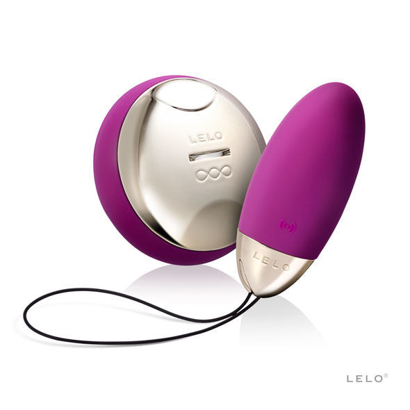 LELO Lyla 2 Insignia Design Edition purple massage egg with sleek design and textured surface, placed on a soft fabric.