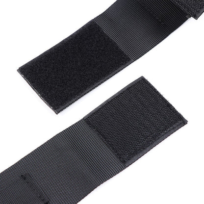 Pair of nylon wrist cuffs from OHMAMA FETISH, adjustable bondage restraints with metal hardware for BDSM role-play.
