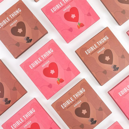 Secret Play Tanga Gominola Fresa in vibrant pink, showcasing a playful design with a strawberry theme.