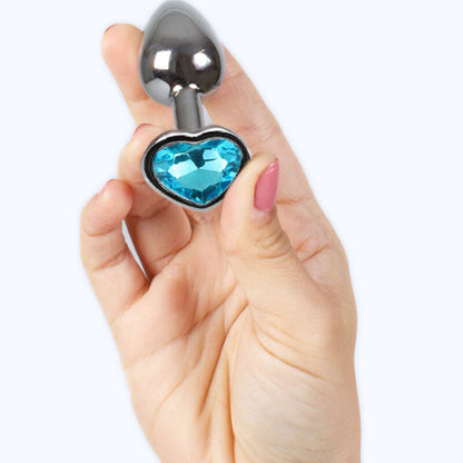 Small blue heart-shaped metal butt plug by SECRETPLAY, measuring 7 cm, with a smooth, shiny finish.