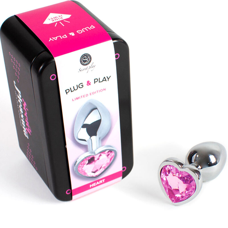 Plug anal en forma de corazón fucsia, tamaño pequeño, de la marca SECRETPLAY TOYS, de metal, con 7 cm de longitud.