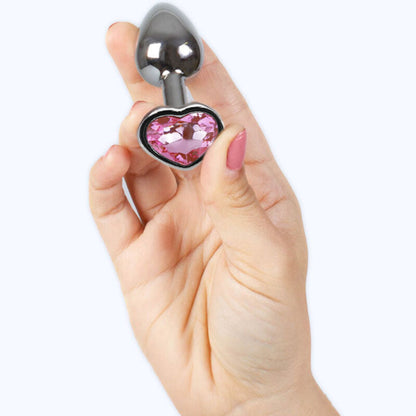 Plug anal de metal en forma de corazón fucsia, tamaño S, de SECRETPLAY TOYS, de 7 cm de longitud.