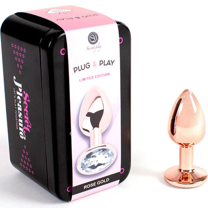 Plug anal de metal rosa dorado SECRETPLAY, tamaño S, 7 cm, con forma ergonómica y superficie lisa para uso cómodo.